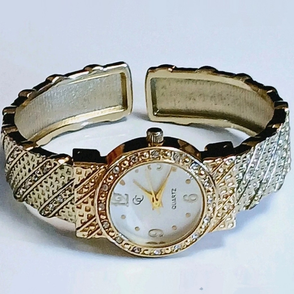 Ladies Charming Charlie Gold With Gemstones 7" Cuff Watch